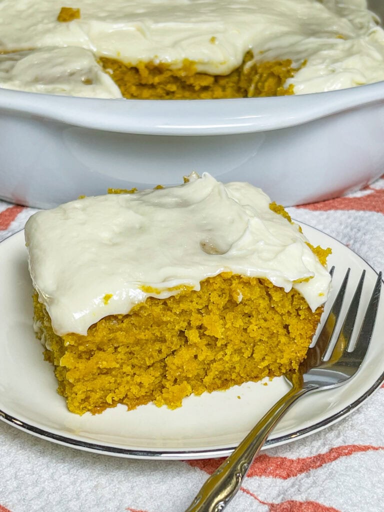 If you love a pumpkin roll, you'll love this Pumpkin Roll Cake! It tastes just like a pumpkin roll but its easier to make and no rolling required!