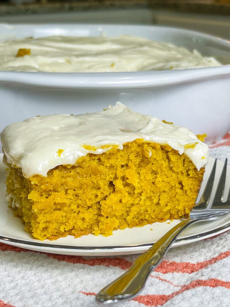 If you love a pumpkin roll, you'll love this Pumpkin Roll Cake! It tastes just like a pumpkin roll but its easier to make and no rolling required!