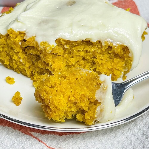 If you love a pumpkin roll, you'll love this Pumpkin Roll Cake! It tastes just like a pumpkin roll but its easier to make and no rolling required!