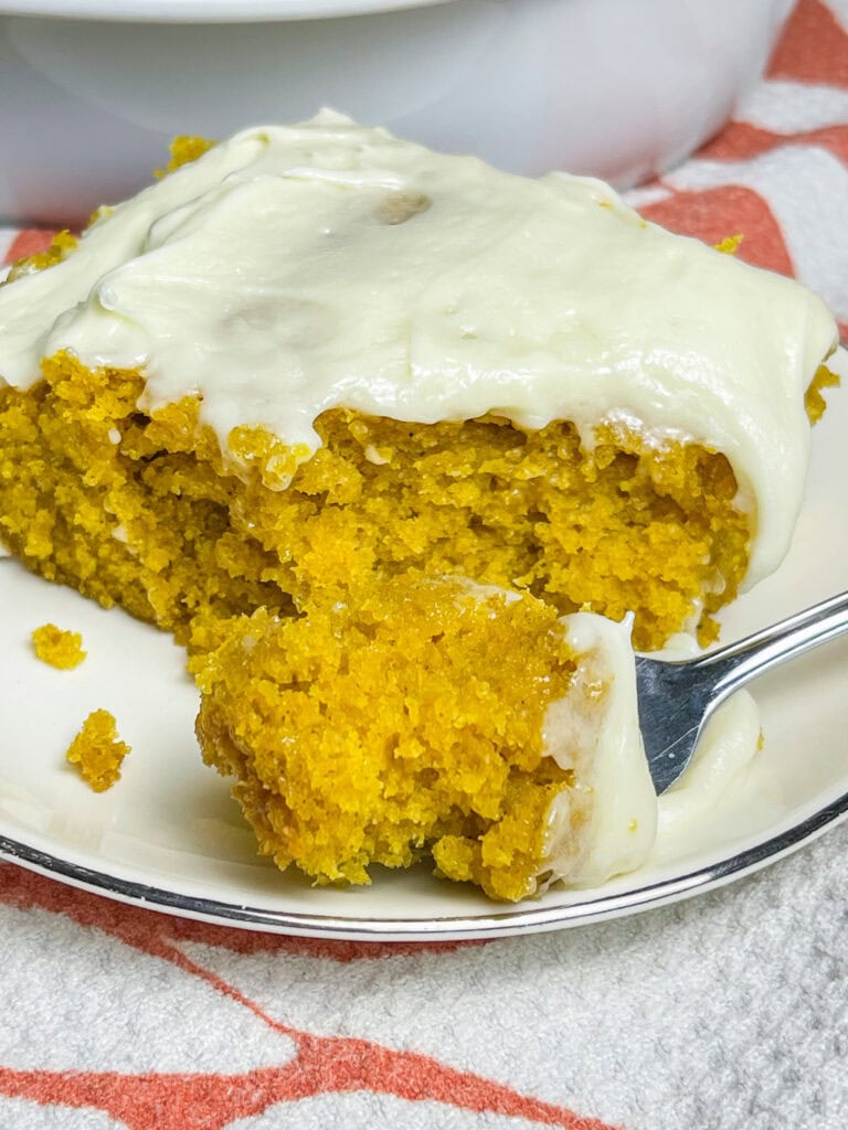 If you love a pumpkin roll, you'll love this Pumpkin Roll Cake! It tastes just like a pumpkin roll but its easier to make and no rolling required!