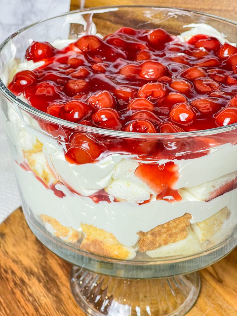 Cherries in the Snow is a delicious vintage recipe with minimal ingredients that feeds a crowd and can be made the day before, making it the perfect party dessert.