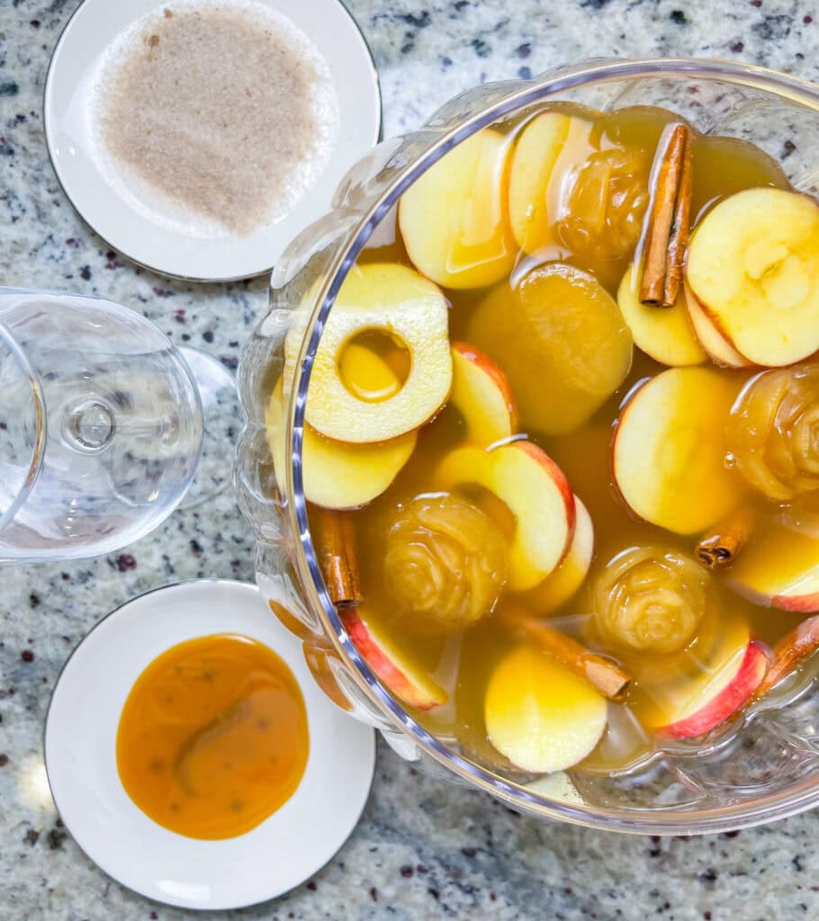 A refreshing autumn cocktail, Sparkling Apple Cider Sangria is made with simple ingredients-prosecco, apple cider, amaretto and club soda. It's a perfect pitcher drink for any occasion.