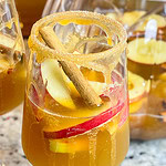 A refreshing autumn cocktail, Sparkling Apple Cider Sangria is made with simple ingredients-prosecco, apple cider, amaretto and club soda. It's a perfect pitcher drink for any occasion.