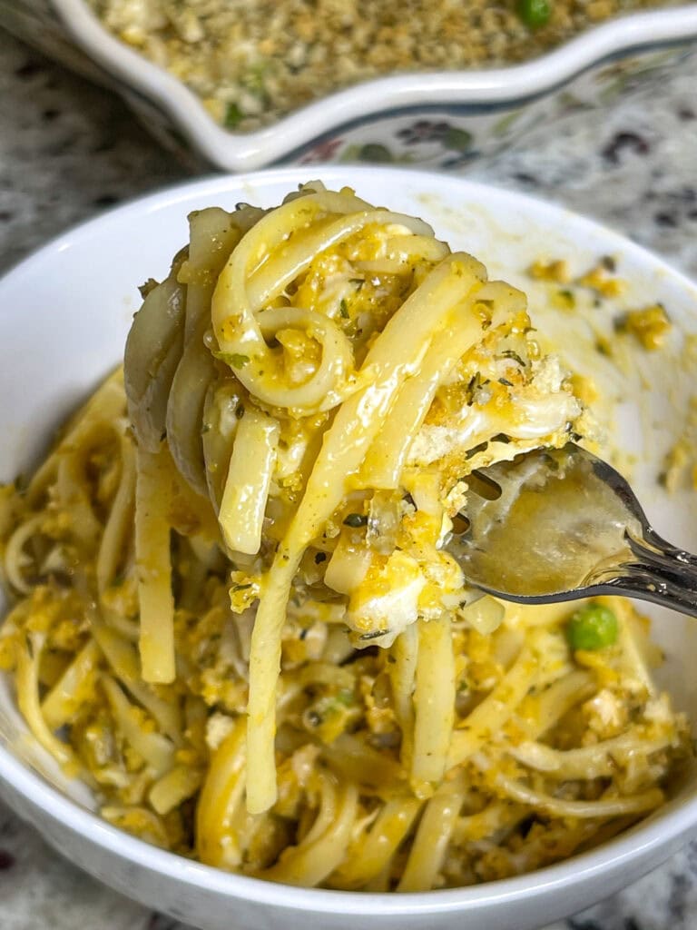 Turkey Tetrazzini is a creamy, comforting casserole that turns leftover Thanksgiving turkey into a new family favorite! Tender turkey is tossed with pasta in a rich, velvety sauce made from cream, chicken broth, and Parmesan cheese, then baked to golden perfection with a crispy breadcrumb topping. The dish is infused with flavors of garlic, mushrooms, and a hint of nutmeg for a cozy, satisfying meal. It’s the ultimate way to make the most of your holiday leftovers while delivering a hearty, crowd-pleasing dinner! Serve it with a fresh green salad or steamed veggies for a complete meal.