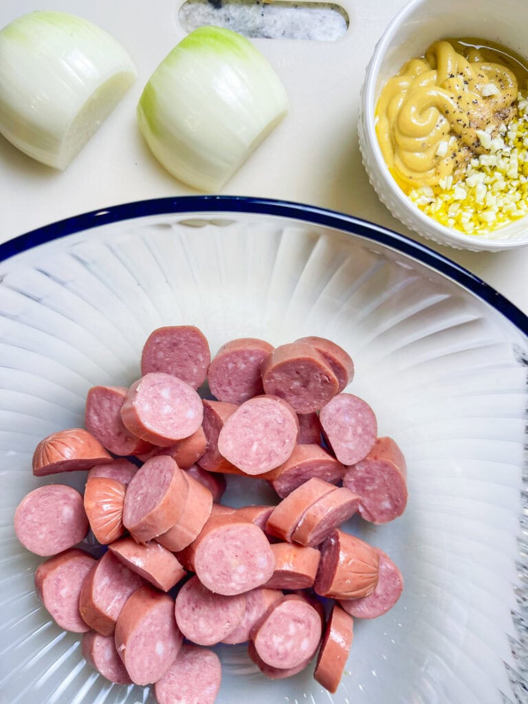 Looking for an easy, crowd-pleasing dinner that’s perfect for busy weeknights? This Sheet Pan Kielbasa and Pierogi is the answer! With minimal prep and just one pan to clean, this meal comes together in under 30 minutes and is packed with bold, savory flavors. I love how smoky kielbasa pairs perfectly with the golden brown pierogi and crisp-tender green beans for a hearty, satisfying dinner that feels like comfort food at its best. Whether you’re feeding a hungry family or just looking for a simple meal idea, this recipe is sure to become a new weeknight favorite!