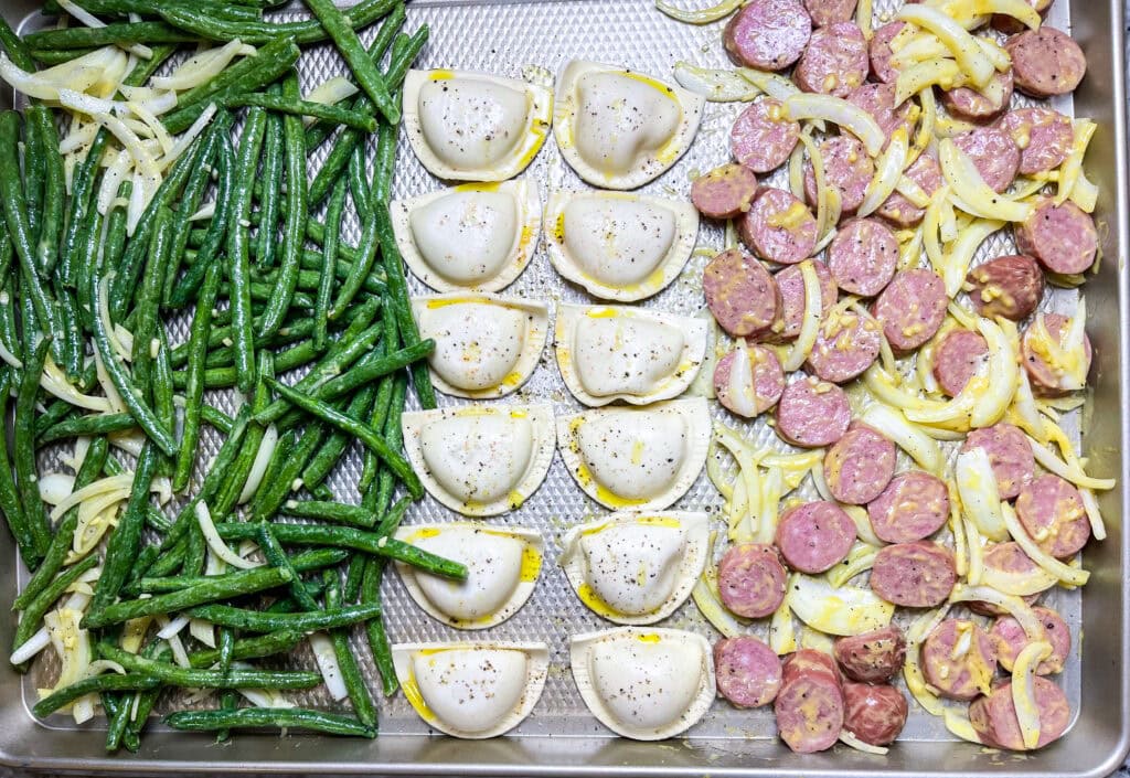 Looking for an easy, crowd-pleasing dinner that’s perfect for busy weeknights? This Sheet Pan Kielbasa and Pierogi is the answer! With minimal prep and just one pan to clean, this meal comes together in under 30 minutes and is packed with bold, savory flavors. I love how smoky kielbasa pairs perfectly with the golden brown pierogi and crisp-tender green beans for a hearty, satisfying dinner that feels like comfort food at its best. Whether you’re feeding a hungry family or just looking for a simple meal idea, this recipe is sure to become a new weeknight favorite!