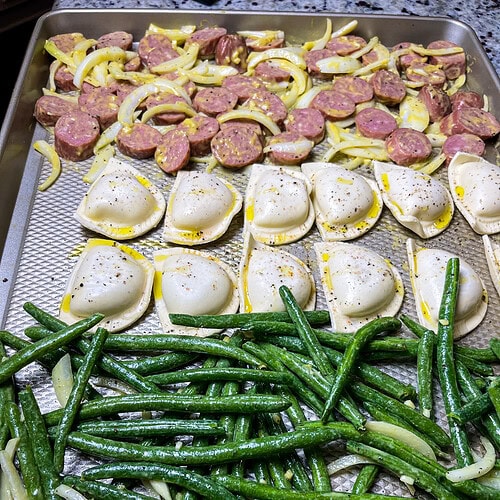 Looking for an easy, crowd-pleasing dinner that’s perfect for busy weeknights? This Sheet Pan Kielbasa and Pierogi is the answer! With minimal prep and just one pan to clean, this meal comes together in under 30 minutes and is packed with bold, savory flavors. I love how smoky kielbasa pairs perfectly with the golden brown pierogi and crisp-tender green beans for a hearty, satisfying dinner that feels like comfort food at its best. Whether you’re feeding a hungry family or just looking for a simple meal idea, this recipe is sure to become a new weeknight favorite!