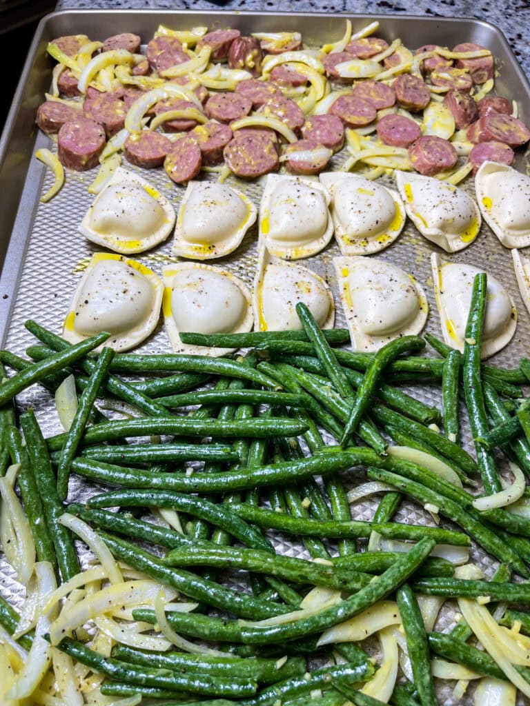 Looking for an easy, crowd-pleasing dinner that’s perfect for busy weeknights? This Sheet Pan Kielbasa and Pierogi is the answer! With minimal prep and just one pan to clean, this meal comes together in under 30 minutes and is packed with bold, savory flavors. I love how smoky kielbasa pairs perfectly with the golden brown pierogi and crisp-tender green beans for a hearty, satisfying dinner that feels like comfort food at its best. Whether you’re feeding a hungry family or just looking for a simple meal idea, this recipe is sure to become a new weeknight favorite!