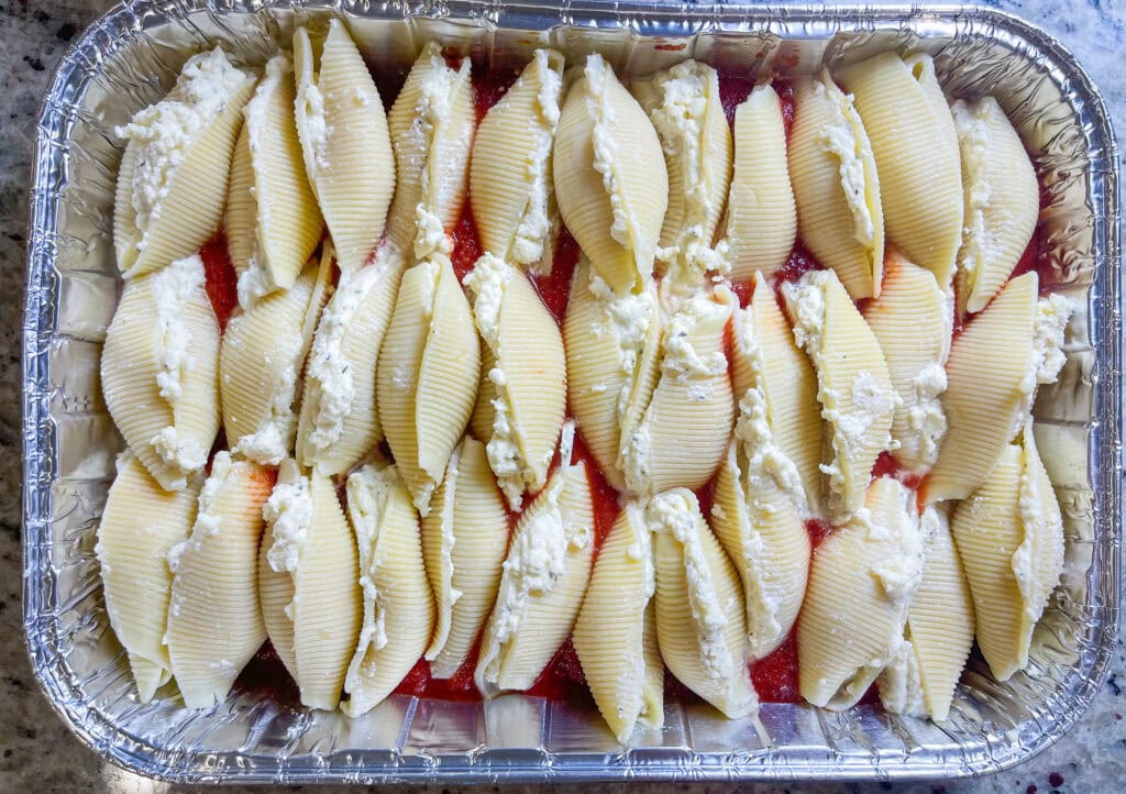 There’s nothing quite like the comfort of a warm, cheesy pasta dish to bring everyone to the table. Classic Stuffed Shells are a timeless favorite, featuring jumbo pasta shells generously filled with creamy ricotta, mozzarella, and parmesan, then nestled in a rich marinara sauce. But what makes this dish even better? It’s completely freezer-friendly! Whether you’re meal prepping for busy weeknights, stocking up for a special occasion, or just want to have a hearty, homemade dinner ready at a moment’s notice, these stuffed shells are the ultimate make-ahead meal. They freeze beautifully and bake up bubbly and delicious straight from the freezer. Perfect for family dinners or sharing with friends, this recipe is as convenient as it is comforting. Let’s dive into how you can make, freeze, and savor this classic dish anytime!