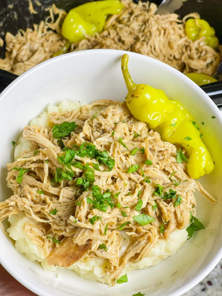 You've heard of (and probably love) Mississippi Pot Roast. This Crock Pot Mississippi Chicken is all the flavors of the OG, but made with chicken. It's so flavorful, juicy and delicious, you'll want to make this dinner on repeat.