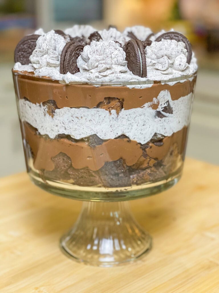 Are you a chocolate lover? I mean, do you really love all things chocolate? If so, this incredibly decadent Chocolate Oreo Brownie Trifle is for you! It's a chocolate lover's dream with a layer of brownies, creamy chocolate pudding, Oreo cookies, all topped off with a homemade Oreo whipped cream. It's divine!