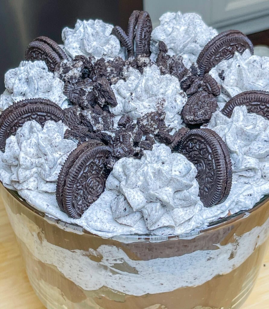 Are you a chocolate lover? I mean, do you really love all things chocolate? If so, this incredibly decadent Chocolate Oreo Brownie Trifle is for you! It's a chocolate lover's dream with a layer of brownies, creamy chocolate pudding, Oreo cookies, all topped off with a homemade Oreo whipped cream. It's divine!