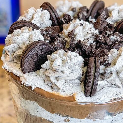 Are you a chocolate lover? I mean, do you really love all things chocolate? If so, this incredibly decadent Chocolate Oreo Brownie Trifle is for you! It's a chocolate lover's dream with a layer of brownies, creamy chocolate pudding, Oreo cookies, all topped off with a homemade Oreo whipped cream. It's divine!