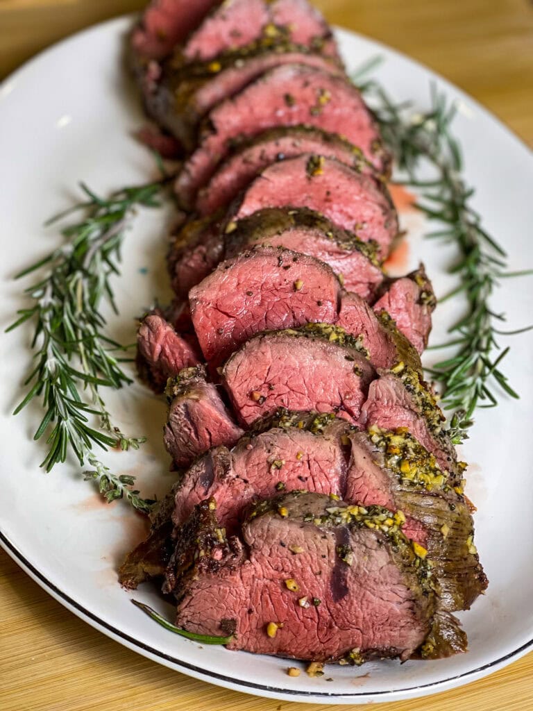 If you are intimidated by cooking a whole beef tenderloin, worry no more! This Easy Beef Tenderloin is seriously so easy, cooked completely in the oven with no searing required. It's the perfect dish to make for any special occasion. Beef tenderloin is the ultimate centerpiece for special occasions, especially during the holidays. While it's undoubtedly a splurge—it is essentially a few pounds of luxurious filet mignon—it’s a dish that delivers unmatched flavor and tenderness, making it worth every penny.