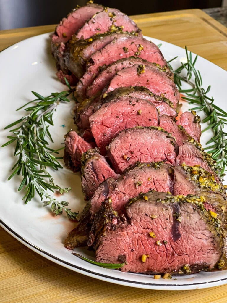 If you are intimidated by cooking a whole beef tenderloin, worry no more! This Easy Beef Tenderloin is seriously so easy, cooked completely in the oven with no searing required. It's the perfect dish to make for any special occasion.

Beef tenderloin is the ultimate centerpiece for special occasions, especially during the holidays. While it's undoubtedly a splurge—it is essentially a few pounds of luxurious filet mignon—it’s a dish that delivers unmatched flavor and tenderness, making it worth every penny.