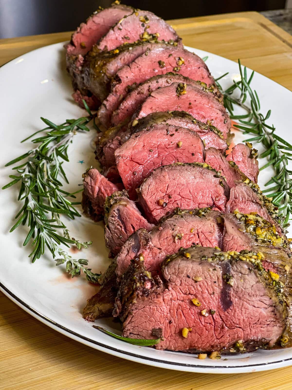 If you are intimidated by cooking a whole beef tenderloin, worry no more! This Easy Beef Tenderloin is seriously so easy, cooked completely in the oven with no searing required. It's the perfect dish to make for any special occasion. Beef tenderloin is the ultimate centerpiece for special occasions, especially during the holidays. While it's undoubtedly a splurge—it is essentially a few pounds of luxurious filet mignon—it’s a dish that delivers unmatched flavor and tenderness, making it worth every penny.