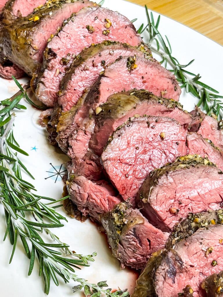 If you are intimidated by cooking a whole beef tenderloin, worry no more! This Easy Beef Tenderloin is seriously so easy, cooked completely in the oven with no searing required. It's the perfect dish to make for any special occasion. Beef tenderloin is the ultimate centerpiece for special occasions, especially during the holidays. While it's undoubtedly a splurge—it is essentially a few pounds of luxurious filet mignon—it’s a dish that delivers unmatched flavor and tenderness, making it worth every penny.