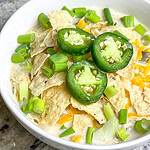 Warm, creamy, and full of flavor, Crock Pot White Chicken Chili is the ultimate comfort food for any season. This hearty, slow-cooked dish combines tender shredded chicken, white beans, and a medley of savory spices in a creamy, flavorful broth. Fresh jalapeños add a subtle heat, while cream cheese and a touch of heavy cream gives the chili its signature richness. With every spoonful, you’ll enjoy the perfect balance of smoky, tangy, and zesty flavors.