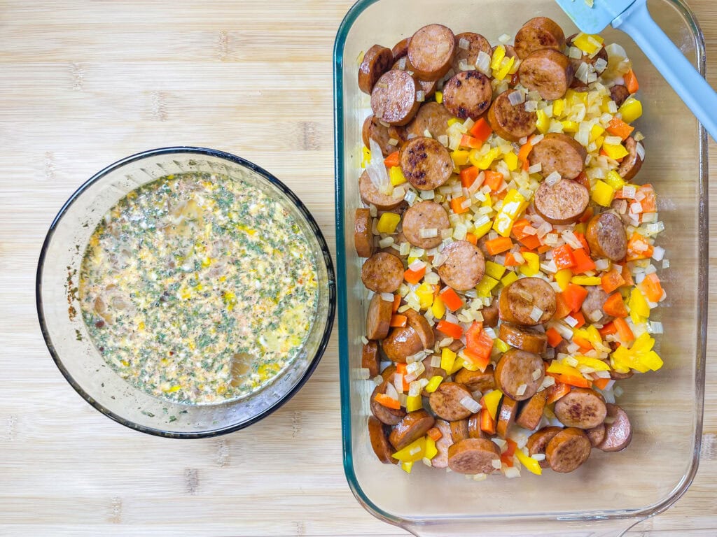 This Andouille Sausage Breakfast Casserole is flavor packed with savory smoked andouille sausage, tender hashbrown potatoes, fluffy eggs, vibrant bell peppers, and gooey melted cheese. Baked to golden perfection, this casserole is the ultimate crowd-pleaser for brunches and holiday mornings!