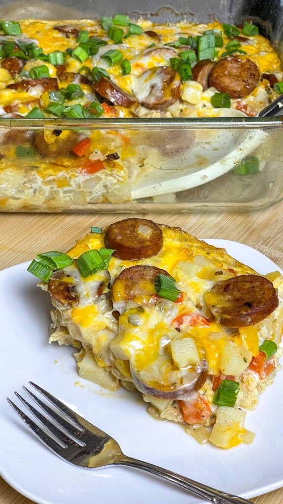 This  Andouille Sausage Breakfast Casserole is flavor packed with savory smoked andouille sausage, tender hashbrown potatoes, fluffy eggs, vibrant bell peppers, and gooey melted cheese. Baked to golden perfection, this casserole is the ultimate crowd-pleaser for brunches and holiday mornings!