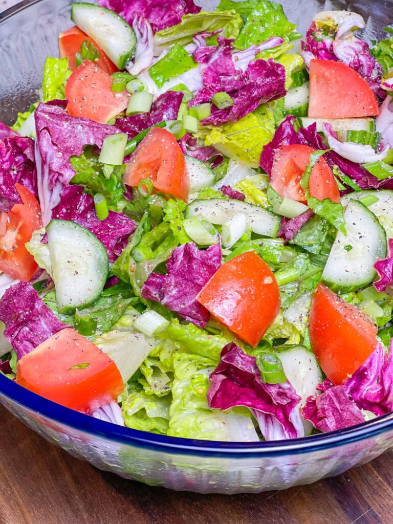 This simple Salad with Lemon Garlic Vinaigrette is the perfect accompaniment to any dish or base to add your favorite protein for a flavorful and balanced meal.

I love a simple and fresh salad and this one is so easy! You probably already have the ingredients on hand in your pantry for the vinaigrette.