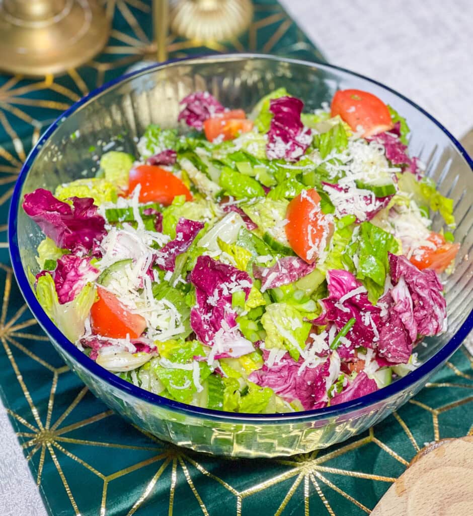 This simple Salad with Lemon Garlic Vinaigrette is the perfect accompaniment to any dish or base to add your favorite protein for a flavorful and balanced meal. I love a simple and fresh salad and this one is so easy! You probably already have the ingredients on hand in your pantry for the vinaigrette.