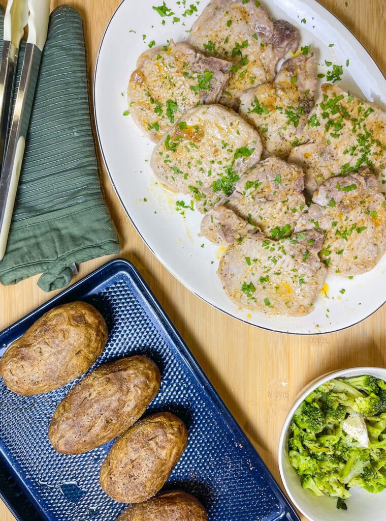 Sheet Pan Ranch Pork Chops are simple pork chops rubbed in a garlic ranch oil and baked to perfection. These are the ultimate weeknight dinner solution—quick, flavorful, and mess-free!