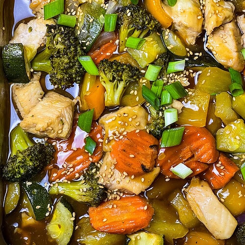 Sheet Pan Teriyaki Chicken with vegetables is a delicious, one-pan meal that combines tender, juicy chicken with colorful veggies, all coated in savory teriyaki sauce.