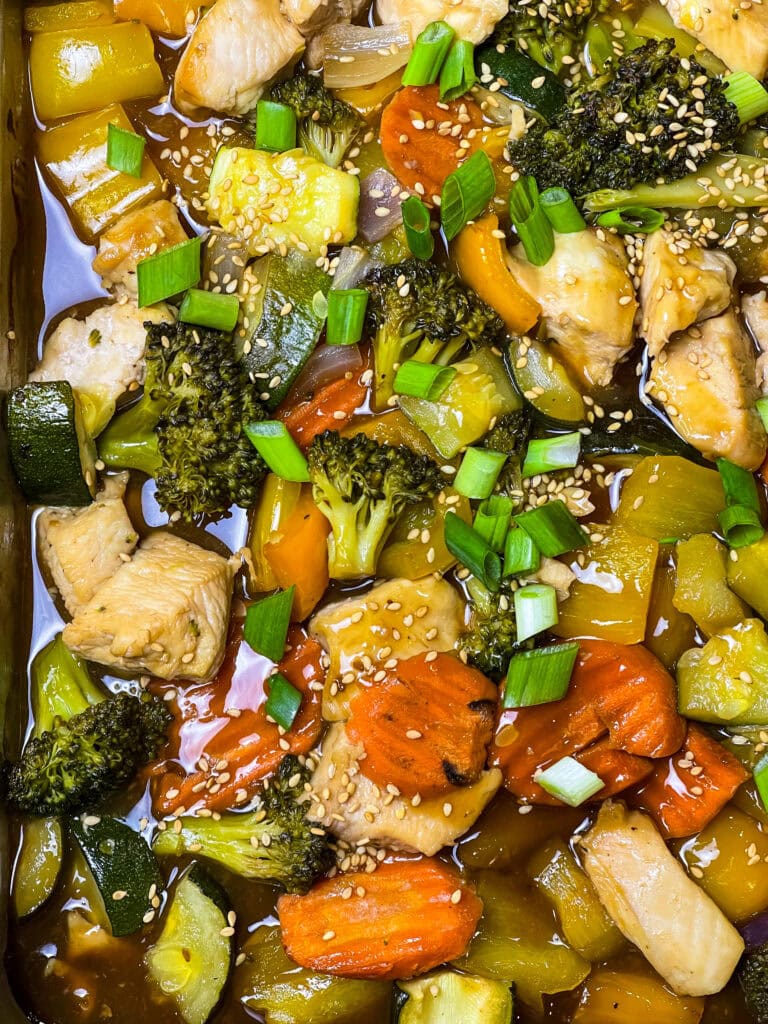 Sheet Pan Teriyaki Chicken with vegetables is a delicious, one-pan meal that combines tender, juicy chicken with colorful veggies, all coated in savory teriyaki sauce.