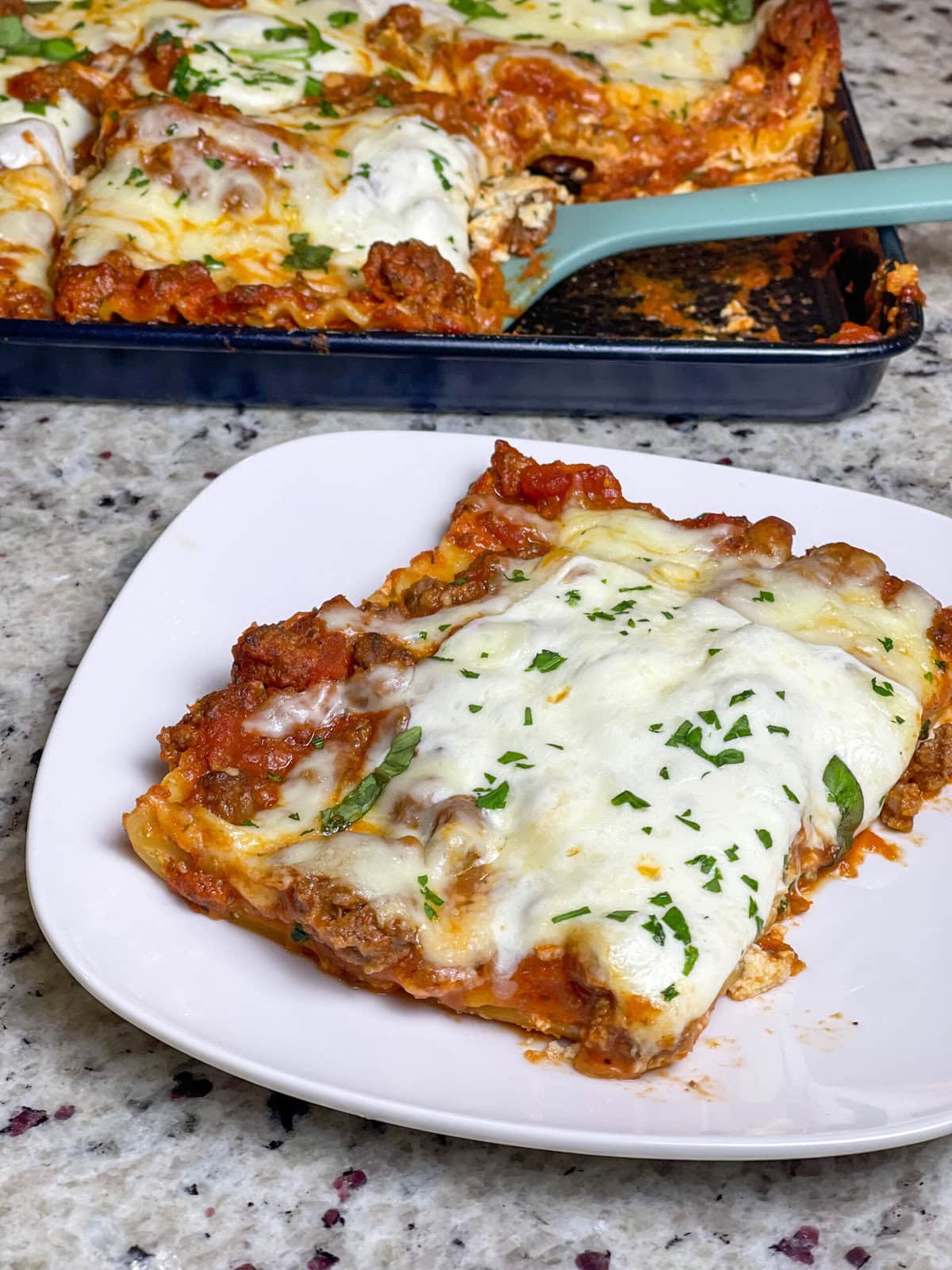 Sheet Pan Lasagna is a twist on the classic layered Italian comfort dish. By assembling the no bake lasagna noodles, marinara sauce, creamy ricotta, and gooey melted cheese on a single sheet pan, this version ensures every bite has the perfect balance of flavors and textures.