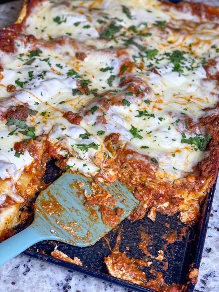 Sheet Pan Lasagna is a twist on the classic layered Italian comfort dish. By assembling the no bake lasagna noodles, marinara sauce, creamy ricotta, and gooey melted cheese on a single sheet pan, this version ensures every bite has the perfect balance of flavors and textures.