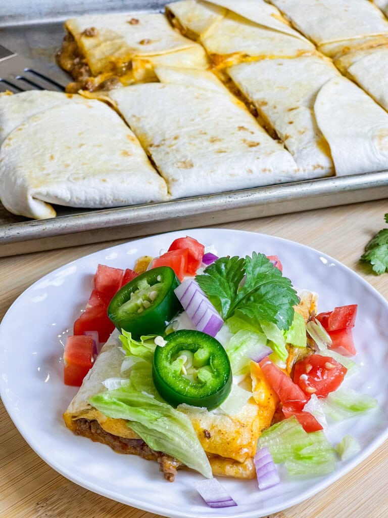 Sheet Pan Quesadillas are easy, kid friendly, quick, and they feed a crowd! Keeping the filling simple allows everyone to customize their favorite toppings. 