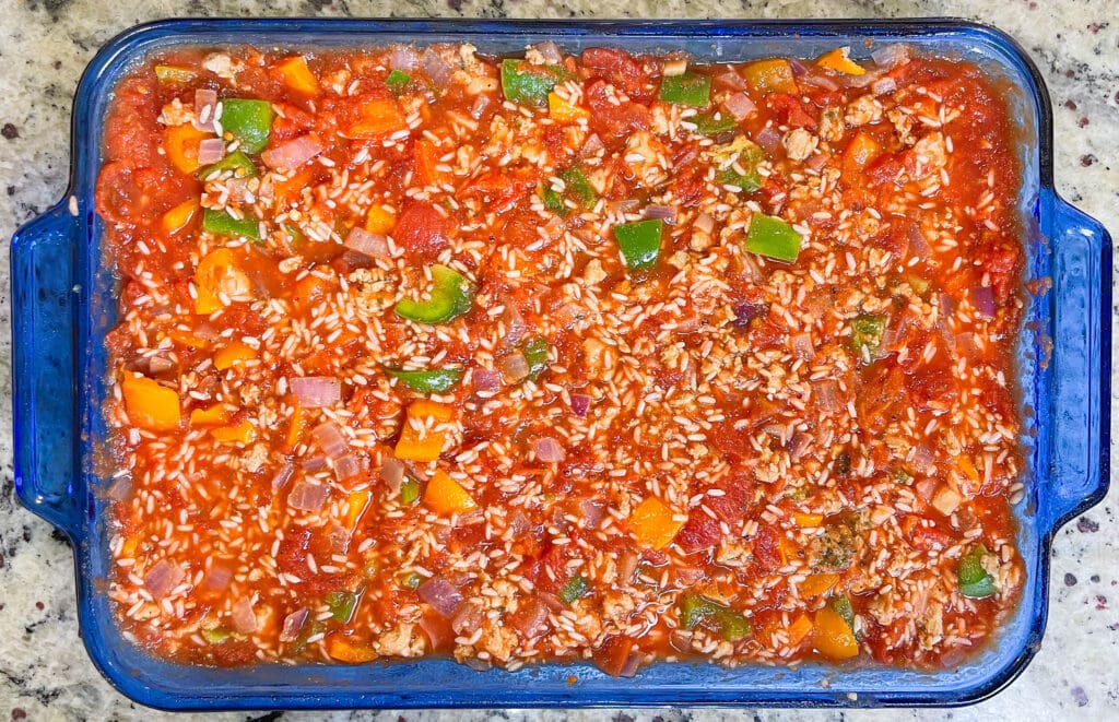 This casserole is well rounded with a carb (brown or white rice), protein (ground turkey or lean ground beef), and your vegetables (onions, bell peppers, and canned diced tomatoes).